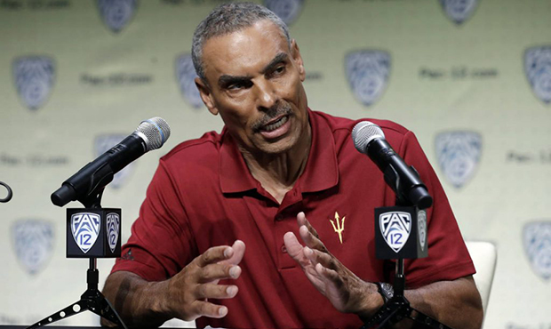 Arizona State head coach Herm Edwards answers questions during the Pac-12 Conference NCAA college f...