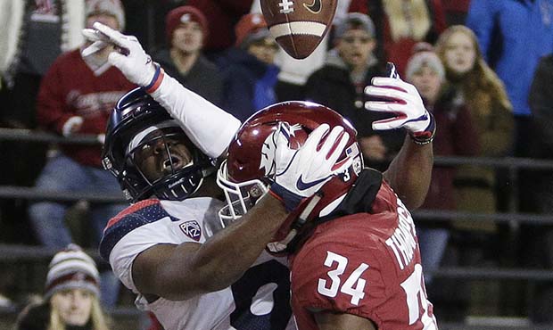 Washington State safety Jalen Thompson (34) disrupts a pass intended for Arizona wide receiver Shun...