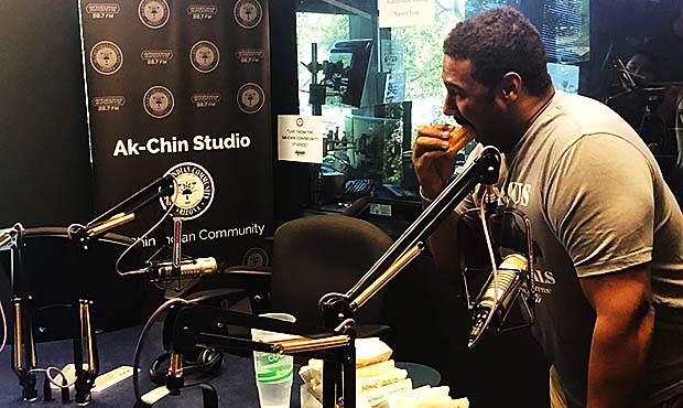 98.7 FM's Max Starks attacks an impromptu hot dog eating challenge