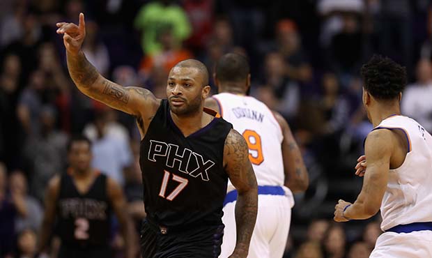 P.J. Tucker #17 of the Phoenix Suns reacts during overtime of the NBA game against the New York Kni...
