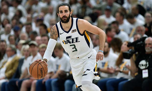 Ricky Rubio #3 of the Utah Jazz brings the ball up court against the Houston Rockets in the first h...