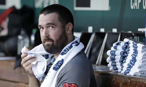 Arizona Diamondbacks starting pitcher Robbie Ray sits in the dugout during the first inning of the ...