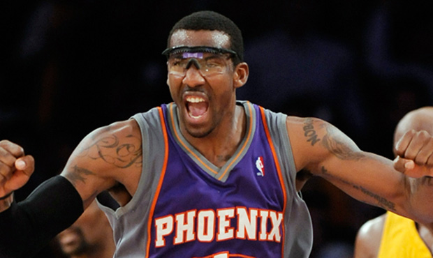 FILE - This May 27, 2010, file photo shows Phoenix Suns forward Amare Stoudemire reacting after a d...