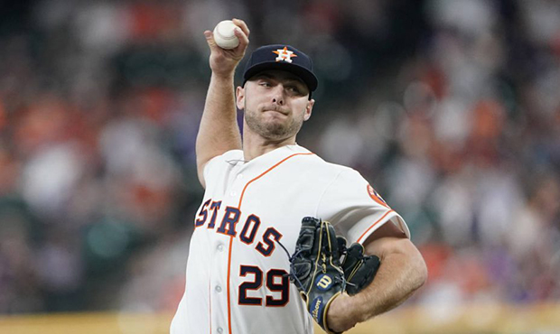 Houston Astros starting pitcher Corbin Martin throws during the first inning of a baseball game aga...