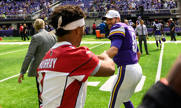 Kirk Cousins #8 of the Minnesota Vikings greets Kyler Murray #1 of the Arizona Cardinals after the ...