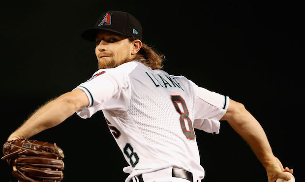Starting pitcher Mike Leake #8 of the Arizona Diamondbacks throws a warm-up pitch during the first ...