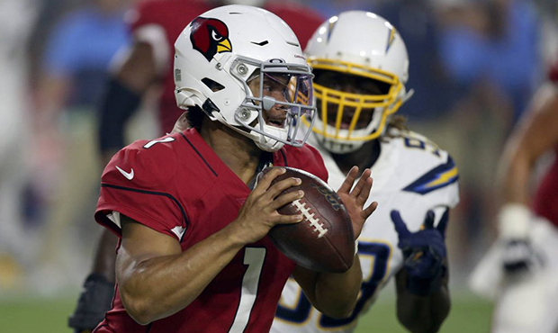 Arizona Cardinals quarterback Kyler Murray (1) scrambles against the Los Angeles Chargers during th...