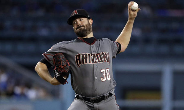 Arizona Diamondbacks starting pitcher Robbie Ray throws to the Los Angeles Dodgers during the first...