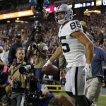 Oakland Raiders tight end Derek Carrier (85) celebrates his touchdown against the Arizona Cardinals during the first half of an an NFL football game, Thursday, Aug. 15, 2019, in Glendale, Ariz. (AP Photo/Rick Scuteri)