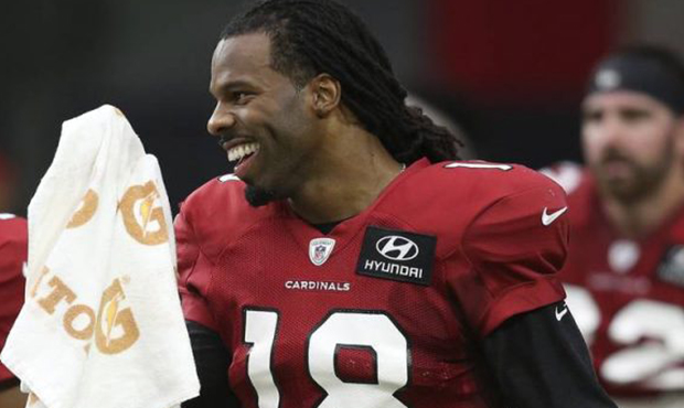 Arizona Cardinals wide receivers Kevin White (18) and Pharoh Cooper (12) laugh during a break in NF...
