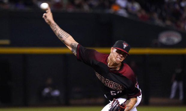 Arizona Diamondbacks relief pitcher Yoan Lopez throws against the Los Angeles Dodgers in the sevent...