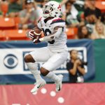 Arizona wide receiver Jamarye Joiner celebrates his second-quarter touchdown against Hawaii during an NCAA college football game Saturday, Aug. 24, 2019, in Honolulu. (AP Photo/Marco Garcia)