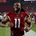 Arizona Cardinals wide receiver Larry Fitzgerald (11) celebrates wide receiver Damiere Byrd scored a touchdown against the Los Angeles Chargers during the first half of an NFL preseason football game, Thursday, Aug. 8, 2019, in Glendale, Ariz. (AP Photo/Ross D. Franklin)