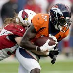 Denver Broncos wide receiver Fred Brown (19) makes the catch as Arizona Cardinals linebacker Brooks Reed defends during the first half of an NFL preseason football game, Thursday, Aug. 29, 2019, in Denver. (AP Photo/Jack Dempsey)
