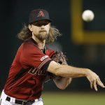 Arizona Diamondbacks pitcher Mike Leake throws against the Colorado Rockies in the first inning during a baseball game, Wednesday, Aug. 21, 2019, in Phoenix. (AP Photo/Rick Scuteri)