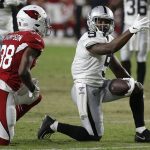 Oakland Raiders wide receiver De'Mornay Pierson-El (9) signals first down as Arizona Cardinals defensive back Jalen Thompson (38) looks on during the second half of an an NFL preseason football game, Thursday, Aug. 15, 2019, in Glendale, Ariz. (AP Photo/Rick Scuteri)