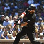 Washington Nationals Adam Eaton (2) hits a home run during the first inning of a baseball game against the Chicago Cubs Friday, Aug. 23, 2019, in Chicago. (AP Photo/Matt Marton)