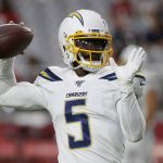 Los Angeles Chargers quarterback Tyrod Taylor (5) warms up prior to an NFL preseason football game against the Arizona Cardinals, Thursday, Aug. 8, 2019, in Glendale, Ariz. (AP Photo/Rick Scuteri)
