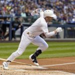 Milwaukee Brewers' Ryan Braun hits an RBI single during the first inning of a baseball game against the Arizona Diamondbacks Friday, Aug. 23, 2019, in Milwaukee. (AP Photo/Morry Gash)