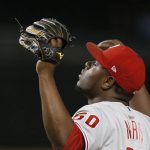 Philadelphia Phillies relief pitcher Hector Neris pauses after the final out of a baseball game against the Arizona Diamondbacks, Monday, Aug. 5, 2019, in Phoenix. The Phillies defeated the Diamondbacks 7-3. (AP Photo/Ross D. Franklin)