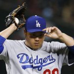 Los Angeles Dodgers starting pitcher Hyun-Jin Ryu, of South Korea, pauses on the mound on his way to giving up four runs to the Arizona Diamondbacks during the fourth inning of a baseball game Thursday, Aug. 29, 2019, in Phoenix. (AP Photo/Ross D. Franklin)