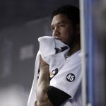 Miami Marlins starting pitcher Hector Noesi looks from the dugout after pitching during the first inning of a baseball game against the Philadelphia Phillies, Friday, Aug. 23, 2019, in Miami. (AP Photo/Lynne Sladky)