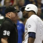 Milwaukee Brewers' Lorenzo Cain argues with home plate umpire Ryan Blakney before being ejected during the fifth inning of a baseball game against the Arizona Diamondbacks Friday, Aug. 23, 2019, in Milwaukee. (AP Photo/Morry Gash)