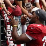 Arizona Cardinals RB David Johnson signs autographs following the team’s Red and White Practice Saturday, August 3, 2019, at State Farm Stadium. (Tyler Drake/Arizona Sports)