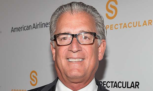 Former professional football referee Mike Pereira arrives on the red carpet at the 2014 Sports Spec...