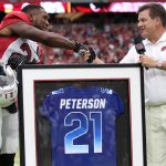 Arizona Cardinals president Michael Bidwill presents CB Patrick Peterson with his Pro Bowl jersey ahead of the team’s Red and White Practice Saturday, August 3, 2019, at State Farm Stadium. (Tyler Drake/Arizona Sports)