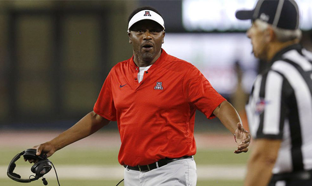 Arizona head coach Kevin Sumlin reacts to an official's call in the first half during an NCAA colle...