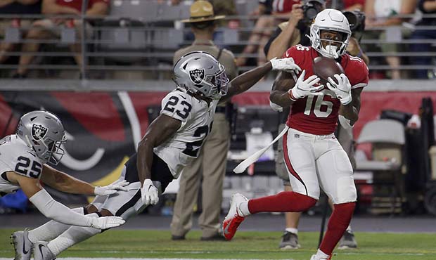 Arizona Cardinals wide receiver Trent Sherfield (16) pulls in a touchdown catch as Oakland Raiders ...