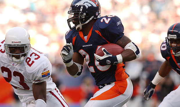 Broncos running back Clinton Portis gains positive yardage in the during 2nd quarter of todays game...