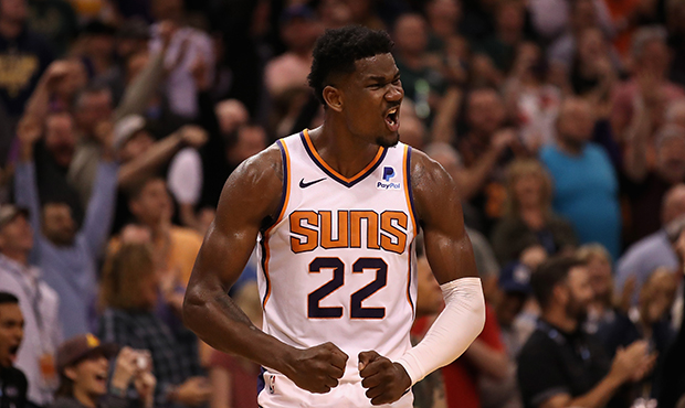 Deandre Ayton #22 of the Phoenix Suns reacts during the final moments of the NBA game against the M...