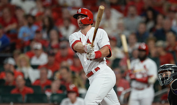 Paul Goldschmidt #46 of the St. Louis Cardinals hits a single in the fourth inning against the Colo...