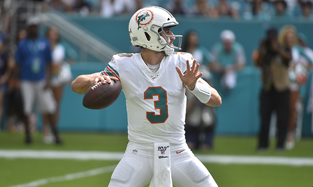Josh Rosen #3 of the Miami Dolphins drops back to pass during the fourth quarter of the game agains...