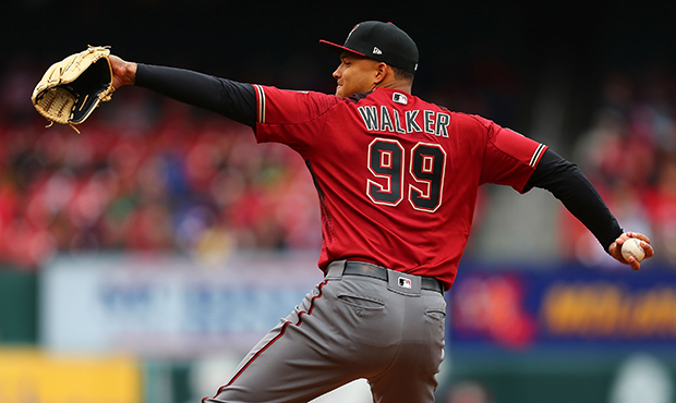 Taijuan Walker #99 of the Arizona Diamondbacks delivers a pitch against the St. Louis Cardinals in ...