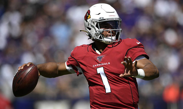 Arizona Cardinals quarterback Kyler Murray throws to a receiver in the first half of an NFL footbal...
