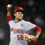 Cincinnati Reds starting pitcher Luis Castillo throws against the Arizona Diamondbacks during the first inning of a baseball game Friday, Sept. 13, 2019, in Phoenix. (AP Photo/Ross D. Franklin)