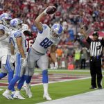 Detroit Lions tight end T.J. Hockenson (88) celebrates his touchdown against the Arizona Cardinals with wide receiver Danny Amendola, center and wide receiver Kenny Golladay, left, during the second half of an NFL football game, Sunday, Sept. 8, 2019, in Glendale, Ariz. (AP Photo/Darryl Webb)