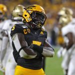 Arizona State running back Eno Benjamin reacts after scoring a touchdown against Colorado during the first half of an NCAA college football game Saturday, Sept. 21, 2019, in Tempe, Ariz. (AP Photo/Rick Scuteri)