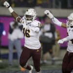 
              Arizona State's Aashari Crosswell, left, celebrates with Chase Lucas (24) after intercepting a pass intended for California's Jordan Duncan in the first half of an NCAA college football game, Friday, Sept. 27, 2019, in Berkeley, Calif. (AP Photo/Ben Margot)
            