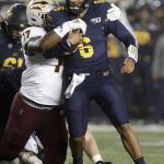 Arizona State's George Lea, left, tackles California quarterback Devon Modster (6) in the first half of an NCAA college football game, Friday, Sept. 27, 2019, in Berkeley, Calif. (AP Photo/Ben Margot)