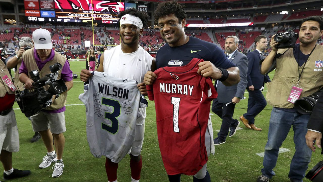 Seattle Seahawks quarterback Russell Wilson, right, and Arizona Cardinals quarterback Kyler Murray,...