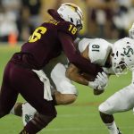 Arizona State safety Aashari Crosswell (16) tackles Sacramento State wide receiver Tao McClinton (81) during the first half of an NCAA college football game Friday, Sept. 6, 2019, in Tempe, Ariz. (AP Photo/Matt York)