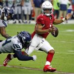 Arizona Cardinals quarterback Kyler Murray (1) is tackled by Seattle Seahawks defensive end Ezekiel Ansah (94) as defensive tackle Quinton Jefferson (99) pursues during the second half of an NFL football game, Sunday, Sept. 29, 2019, in Glendale, Ariz. (AP Photo/Ross D. Franklin)