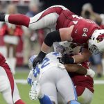 Arizona Cardinals quarterback Kyler Murray is sacked by Detroit Lions outside linebacker Devon Kennard (42) as offensive guard J.R. Sweezy (64) defends during the first half of an NFL football game, Sunday, Sept. 8, 2019, in Glendale, Ariz. (AP Photo/Darryl Webb)