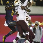 
              Arizona State's Aashari Crosswell (16) intercepts a pass intended for California's Jordan Duncan (2) during the first half of an NCAA college football game Friday, Sept. 27, 2019, in Berkeley, Calif. (AP Photo/Ben Margot)
            