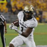 Colorado running back Jaren Mangham carries for a first down against Arizona State during the first half of an NCAA college football game Saturday, Sept. 21, 2019, in Tempe, Ariz. (AP Photo/Rick Scuteri)
