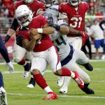 Arizona Cardinals quarterback Kyler Murray (1) scores a touchdown as Seattle Seahawks middle linebacker Bobby Wagner defends during the second half of an NFL football game, Sunday, Sept. 29, 2019, in Glendale, Ariz. (AP Photo/Ross D. Franklin)